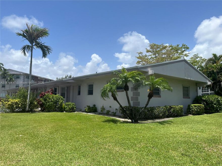 Completely remodeled in 2022.  Lives like a private villa in rare single floor cluster of only 4 units with no neighbors above situated among high end quiet residential homes & dead end street.  New central AC & tankless water heater. New beautiful and functional eat in kitchen with open shelving & quartz countertop. Custom closet cabinetry with deep reach in closet. Spa like master bath with walk in shower. Assigned parking space directly by front door. Laundry facility & storage right next to unit.  24 hr gated community.  Spacious roofed, tiled screened patio overlooks manicured garden & pool. ALL AGES WELCOME! Close proximity to beach, restaurants, medical, conveniences & Gulfstream Casino. Per association no pets allowed. Can Lease after 1 year pending wait list - 20% rental allowed.