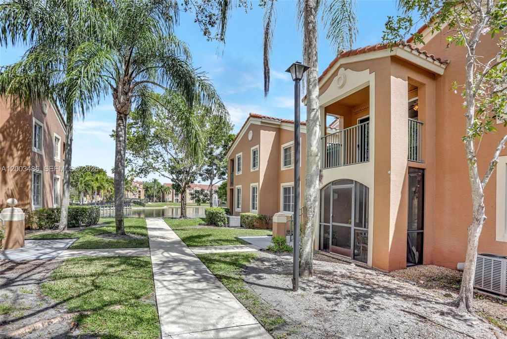 Photo of 4820 N State Road 7 #201, Coconut Creek, FL 33073 (MLS # A12003486)