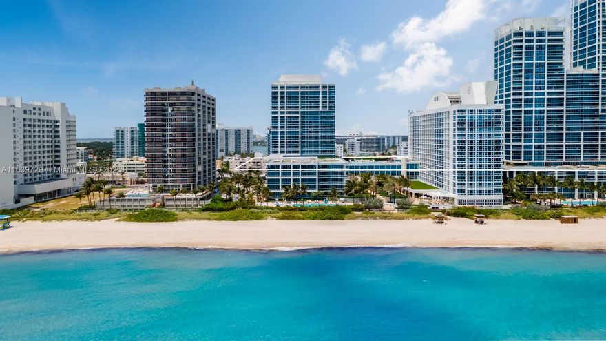 This stunning 2-bed 2-bath condo offers breathtaking views of the sunset and partial downtown skyline. Entertain guests on an expansive balcony which is just like an outdoor “living room.”

Enjoy the ultimate resort lifestyle at Carillon Miami Wellness Resort w/ over 5 acres of pristine oceanfront property, 70,000sqft of wellness facilities & 225+ fitness classes weekly. Amenities abound w/ 4 pools, beach service, juice bar, restaurant, in-suite dining, award winning spa, valet, salon & more. 

Take full advantage of the best Miami Beach has to offer w/ access to a 7 mile beachwalk that connects to spectacular parks, restaurants & entertain venues. Easy access to Miami International Airport, Bal Harbour Shops, Design District and much more!
