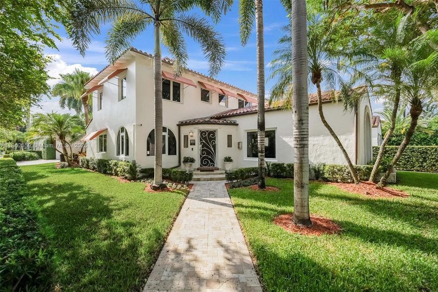 Must See! This rare 3,722 SF historic gem lives even larger than its footprint, set on a lush 7,500 SF corner lot in Miami Beach's charming Palm View neighborhood near Lincoln Road and Sunset Harbor. 
The 4 BR/4 BA home has sep studio apt. Thoughtfully designed spaces, high ceilings, and elegant finishes add scale and comfort. Features impact windows/doors, gas generator, updated sewer lines, barrel tile roof, and heated river rock pool. Sitting rooms, office, and library can be converted to additional bedrooms. Chef's kitchen, 2-car garage, 3-car driveway. Stunning living room w/coral stone fireplace & vaulted 12' beamed ceiling - entertainer's dream.