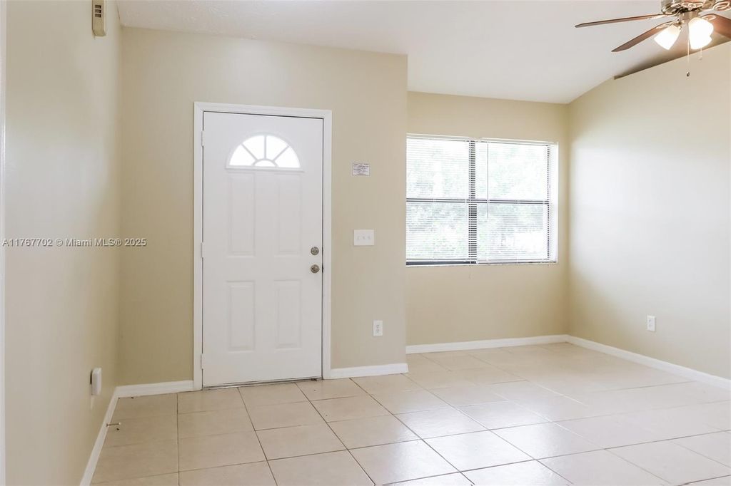 Photo of 524 SW Buswell Ave, Port Saint Lucie, FL 34983 (MLS # A11767702)