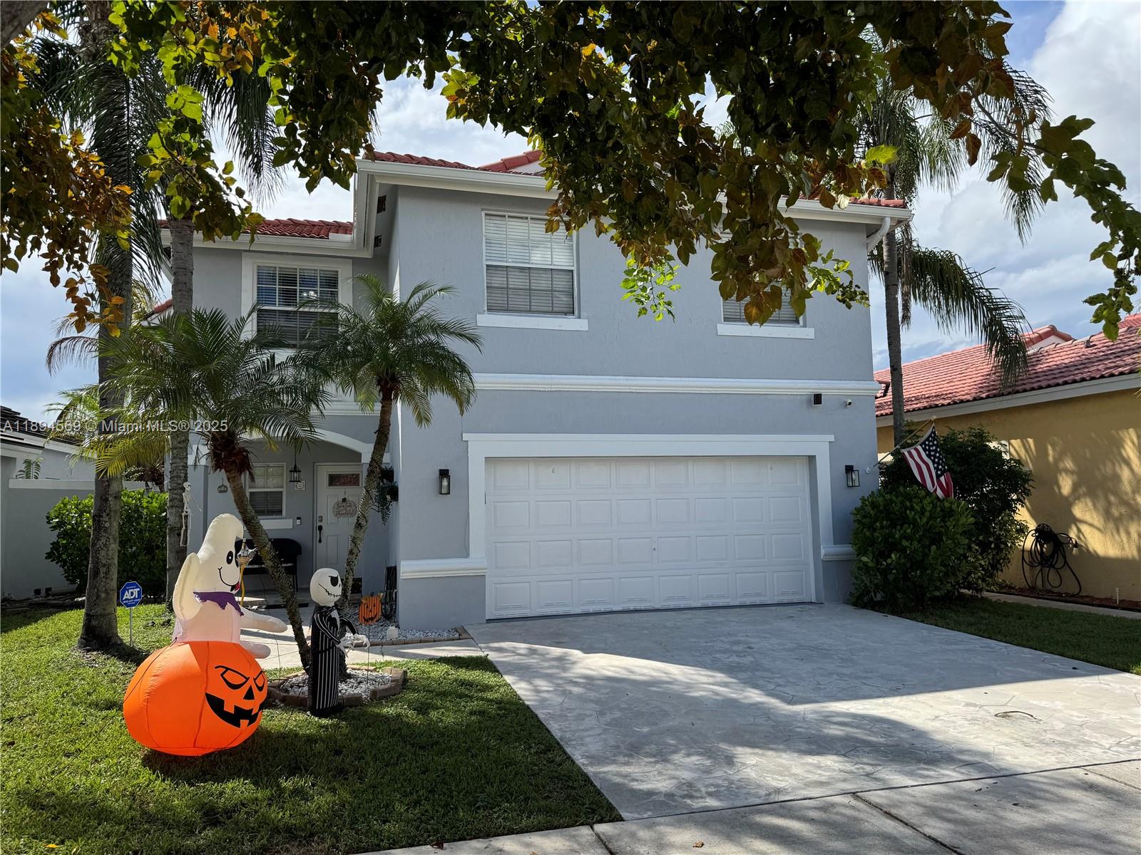 This Move in ready, 4-bedroom 2.5 bath home offers Bright and Airy floor plan with waterfront views from Florida Room, kitchen and master bedroom. Located in sought out Huntington area, surrounded by A+ rated schools with easy access to I-75 and Turnpike. Near great shopping malls like the Pembroke Gardens Open Mall and others. Lots of Parks, Lakes and walking paths. Situated on a private street with no back yard neighbors. Enjoy your time with family & friends at rear Gazebo which includes a bubbling Hot Tub! Open kitchen features granite counter tops, new cabinets & stainless-steel appliances. Fully remodeled baths! No Flood zone X, no flood insurance required. Easy to show.