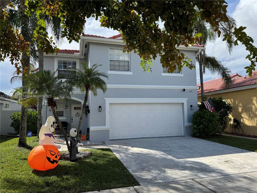 This Move in ready, 4-bedroom 2.5 bath home offers Bright and Airy floor plan with waterfront views from Florida Room, kitchen and master bedroom. Located in sought out Huntington area, surrounded by A+ rated schools with easy access to I-75 and Turnpike. Near great shopping malls like the Pembroke Gardens Open Mall and others.  Lots of Parks, Lakes and walking paths. Situated on a private street with no back yard neighbors. Enjoy your time with family & friends at rear Gazebo which includes a bubbling Hot Tub!  Open kitchen features granite counter tops, new cabinets & stainless-steel appliances. Fully remodeled baths! No Flood zone X, no flood insurance required. Easy to show.