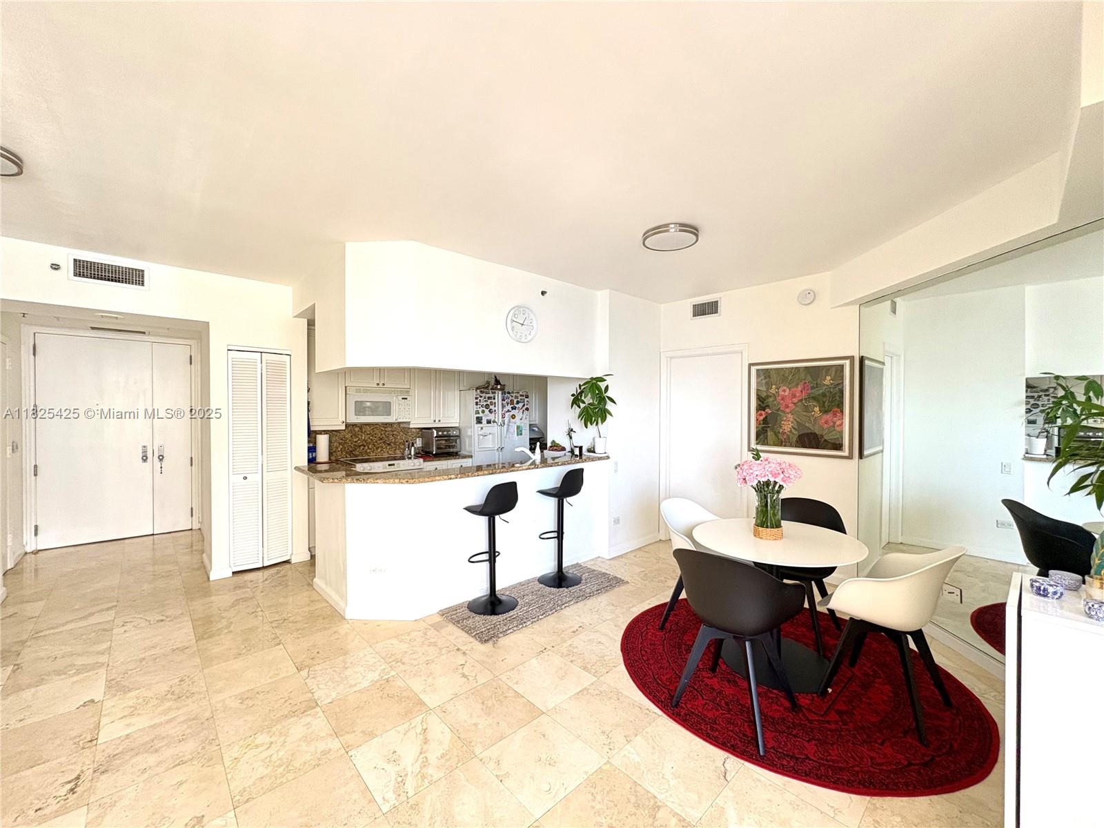Experience luxury living in this spacious and beautiful 1-bedroom, 1.5-bathroom residence, spanning 954 sq ft. Enjoy breathtaking views of the bay and city skyline from your private oasis. The unit features elegant marble floors in the living area, granite countertops, and top-of-the-line appliances, washer & dryer in-unit, along with 1 assigned parking space.
Located in the desirable Two Tequesta Point in Brickell Key, residents can enjoy a range of amenities, including a pool, barbecue area, community room, tennis court, and state-of-the-art exercise room.