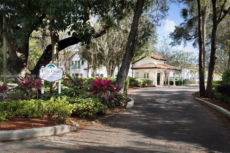 Set in the gated enclave of The Oaks at Hidden Harbour, this spacious townhome offers 3 upstairs bedrooms including a large primary suite with a private balcony. The first floor features a flowing layout with a generous living/dining area, powder room, and eat-in kitchen. Enjoy the convenience of a 2-car garage and a deeded dock accommodating up to a 25' boat with direct Intracoastal access. Community amenities include a resort-style pool, fitness center, and just 39 Mediterranean-style residences for added exclusivity. The boat slip associated with the property is Slip #46.