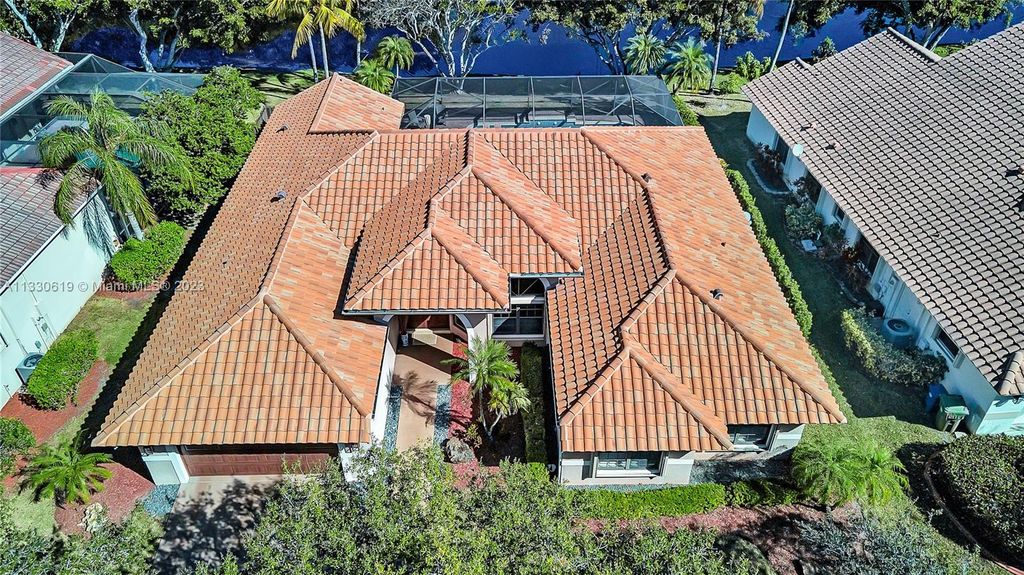 Photo of 1004 Trailmore Ln, Weston, FL 33326 (MLS # A11330619)