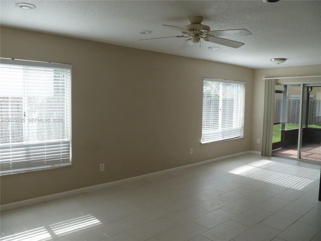 Photo of 8820 SW 13th St, Pembroke Pines, FL 33025 (MLS # A12012125)