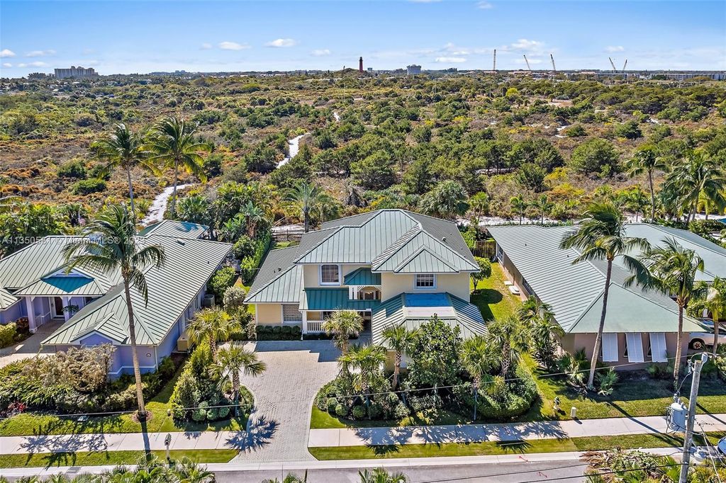 Photo of 32 Coconut Ln, Tequesta, FL 33469 (MLS # A11350581)