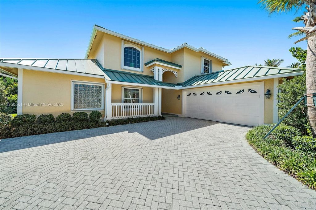 Photo of 32 Coconut Ln, Tequesta, FL 33469 (MLS # A11350581)