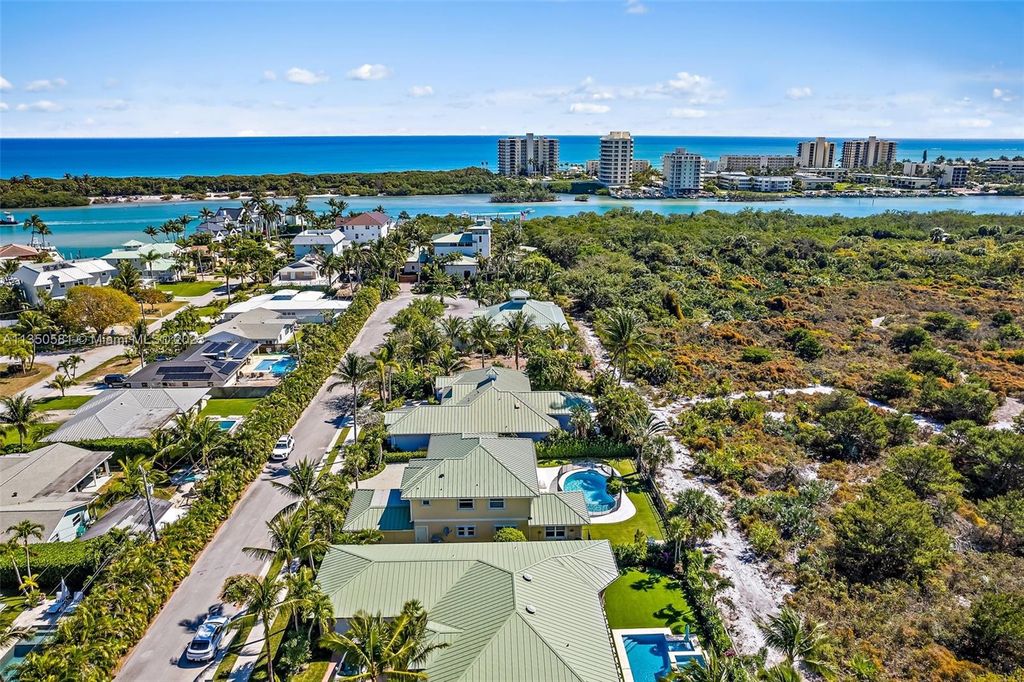 Photo of 32 Coconut Ln, Tequesta, FL 33469 (MLS # A11350581)