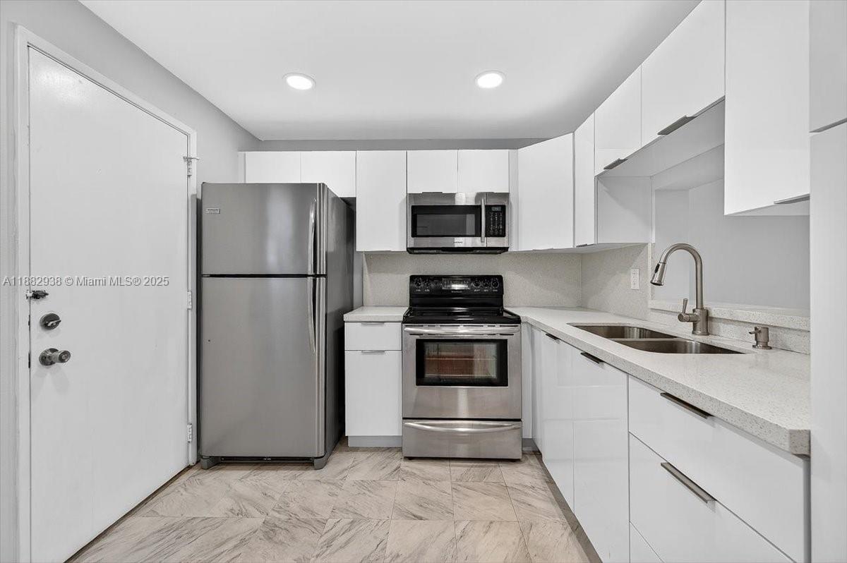 Fabulous 1/1 condo just 1 mile from the beach in an all-ages building! This 3rd-floor unit features a private balcony, beautifully renovated kitchen with quartz countertops, laminate wood floors throughout, and a spacious bedroom with walk-in closet. Building amenities include EV charger, pool, gym, clubhouse, card room, elevator, storage, and common laundry. Perfect location within walking distance to shops, groceries, and restaurants, with quick access to Aventura Mall, Intracoastal, and casinos. 40-year certification complete, rentals allowed after 1 year—ideal for first-time buyers, vacation retreat, or smart investment. Don’t miss this opportunity—schedule a showing today!