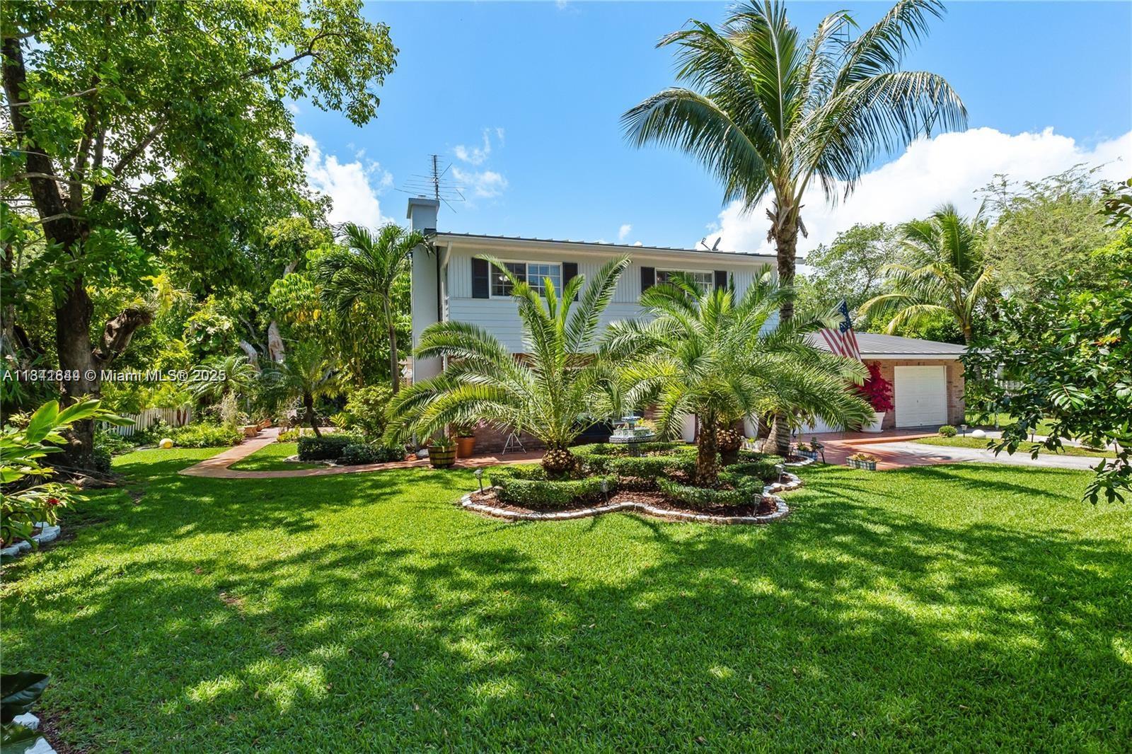 Excellent location in Pinecrest! Charming two-story home with gorgeous outdoor area. Large corner lot with mature fruit trees and expansive landscaping. Home features: 3 bedrooms, 2.5 baths, 2 car garage, new metal roof (2023), heated pool with jacuzzi (2020), impact windows and doors, fireplace, updated kitchen and bath. Don't miss this opportunity to live in Pinecrest! Please call/text Nizar at (305) 815-7958 to show.