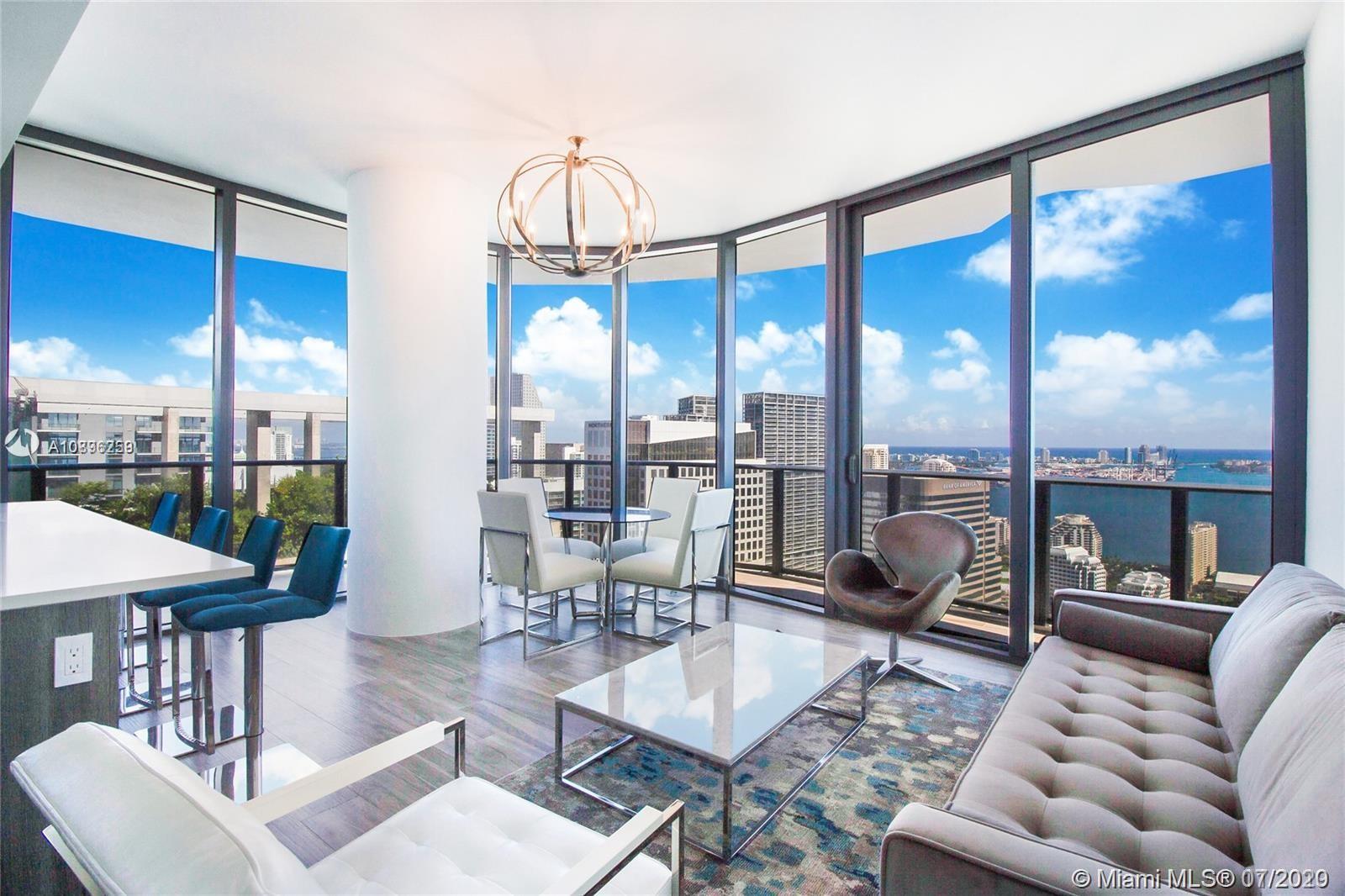 ONE OF A KIND UNIT AVAILABLE. 2 BEDROOM 2 BATHS FULLY FURNISHED UNIT AT SLS LUX, PRIVATE ELEVATOR FOYER! AMAZING UNOBSTRUCTED WATER VIEWS, UNIT FACES DIRECTLY EAST. UNIT COMES WITH 1 ASSIGNED PARKING SPACE. AMENITIES INCLUDE 2 POOLS ON THE 9th FLOOR AND 57th FLOOR. SPA, GYM, TENNIS COURTS, KIDS ROOM, BBQ AREA KATSUYA RESTO AND MUCH MORE. FULLY FURNISHED