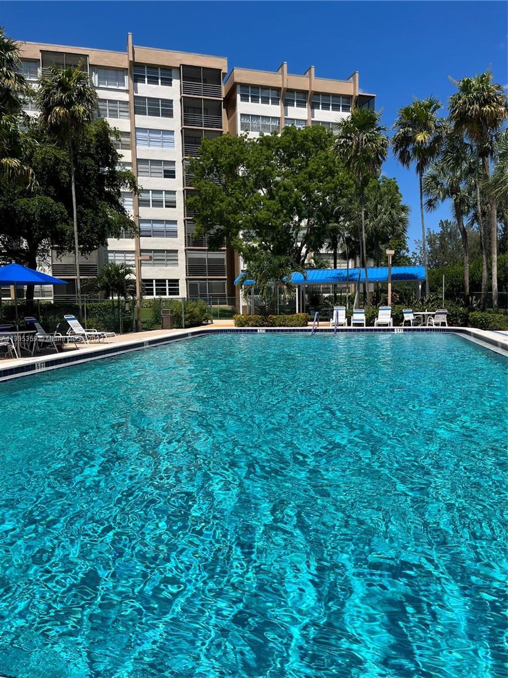 Photo of 1200 Saint Charles Pl #413, Pembroke Pines, FL 33026 (MLS # A11395359)