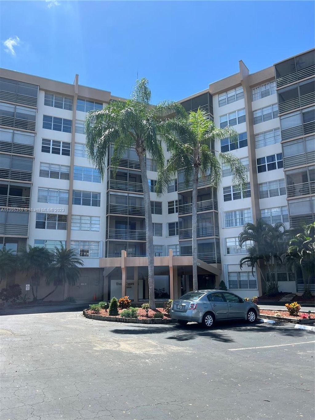 Photo of 1200 Saint Charles Pl #413, Pembroke Pines, FL 33026 (MLS # A11395359)