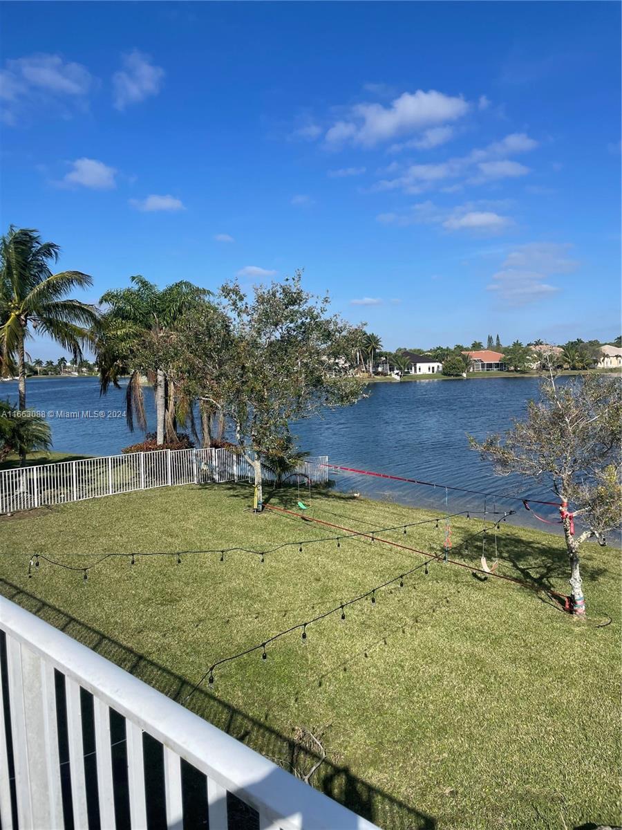 WELCOME TO Pembroke Falls, Subdivision Crystal Harbour. The community has a resort style pool,tennis and basketball courts, Spacious ball room for events, Gym, excersice classes room, gates with secutity guard. sidewalks all neighboors.Two story single-family home with NEW ROOF 2020 . extensive lake view, boasts master bedroom and 2 suites access to the balcony , 4.5 luxurious bathrooms, and a 3-car garage.Gourmet kitchen.Tile flooring on the first floor 2n floor,stairs and master bedroom has real Bamboo floor, has rounded corners, balcony 10 feet deep. This home truly has it all - from the modern finishes to the convenient location. Don't miss out on the opportunity to make this your forever home! the realtor is the son of the seller.... THE PRICE IT'S NEGOTIABLE