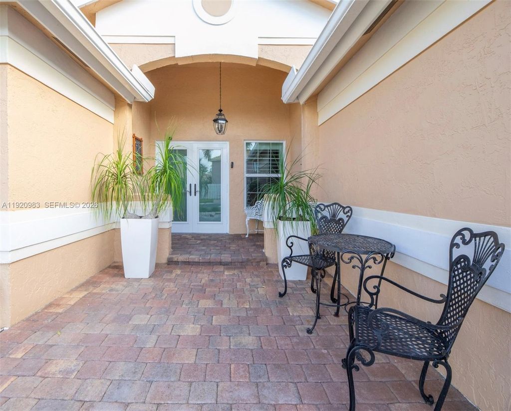 Photo of 1390 NW 129th Ave, Sunrise, FL 33323 (MLS # A11920983)