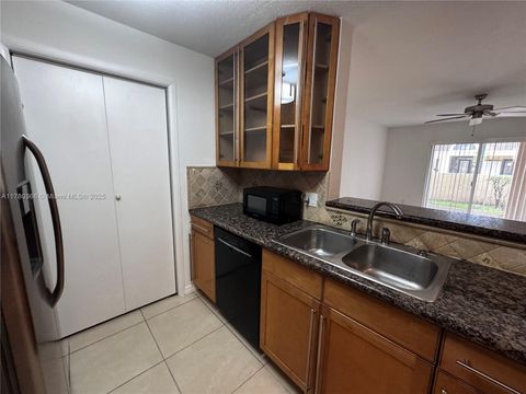 Photo of 875 Riverside Dr #713, Coral Springs, FL 33071 (MLS # A11780366)