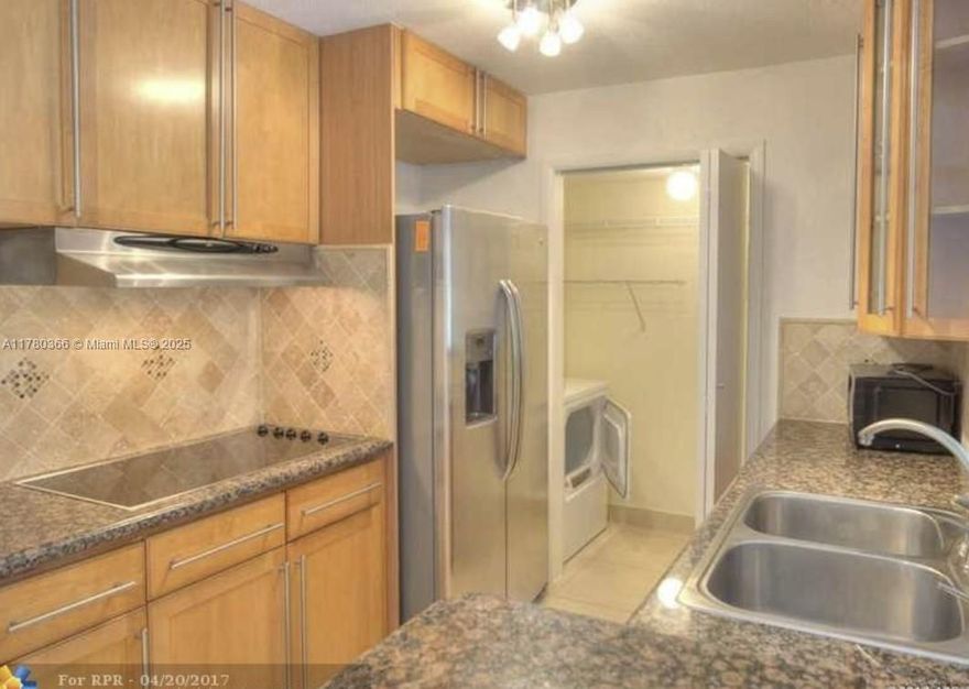This is Savannah at Riverside! It's a beautiful first-floor apartment with bright natural light and a view over the pool area. With the convenience of the first-floor entry, this unit has two bedrooms and two bathrooms that have been completely renovated. The kitchen is wood-colored with a beautiful granite countertop and stainless steel appliances. Savannah at Riverside is located in the City of Coral Springs, within walking distance to BJs, restaurants, stores, Home Depot, Whole Foods Market, Publix, banks, and the Coral Springs Square Mall. This apartment has been substantially renovated and will be free from tenants by May 16th, 2025. This is a Must-see! You will Love it!