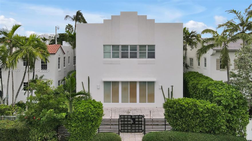 Experience elevated living in this exclusive 2005 condo conversion—a striking blend of historic architecture and modern design by award-winning architect Chad Oppenheim. This architecturally significant residence is located in a boutique building in the vibrant heart of South Beach’s most coveted enclave, just moments from the beach, Lincoln Road, Flamingo Park, and world-class dining.

This bright corner unit on the second floor offers 647 sq ft of refined elegance. Soaring 11+ ft ceilings, bespoke hardwood effect flooring, and oversized windows create a luminous, airy ambiance. The open kitchen impresses with granite counters, GE Profile stainless steel appliances, and sleek recessed lighting. A spa-like marble bathroom and in-unit washer/dryer add everyday luxury.