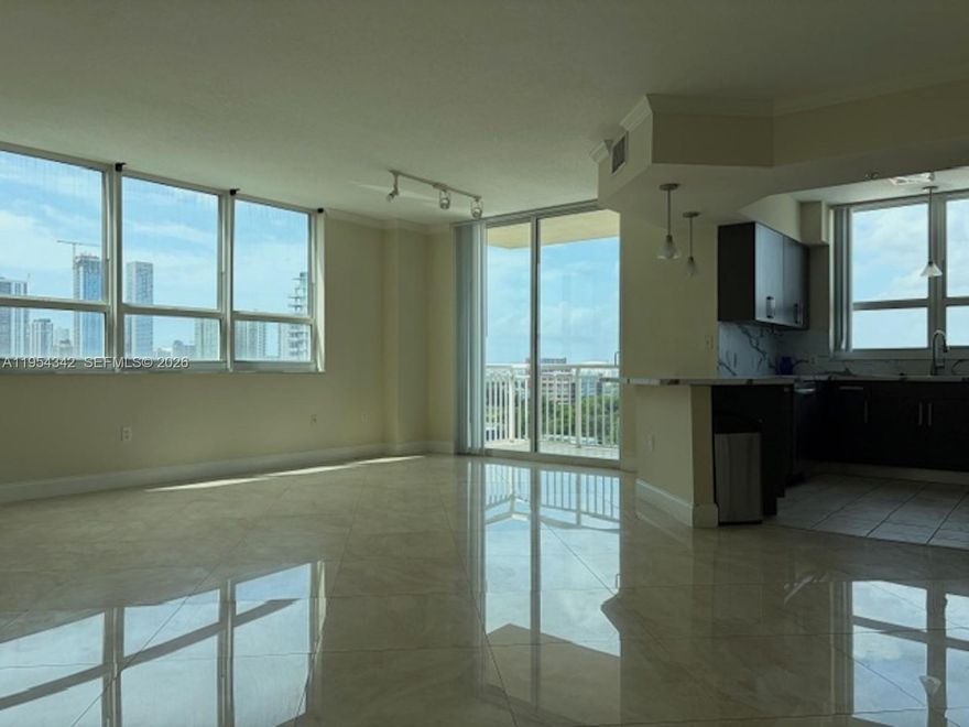 Spacious 3 bedroom, 2 bath, open spacious kitchen with plenty of natural lighting, live in a bay-front building with a park over looking the Miami Beach skyline, vibrant outdoor life style at your doorstep with tennis court, soccer field, and basketball court located right on the bay. Enjoy the well equipped fitness center overlooking the swimming pool, lush landscaping, sun deck, full service building, 24/7 concierge, valet, security, business lounge, club room, management on the site. close proximity to Publix store, Hot Edgewater neighborhood with café, restaurants, banks close to performing art center, museum and Miami Arena, Wynnwood and Design District near by, 15 minutes to South Beach.