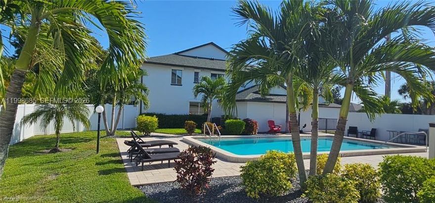 This beautifully updated 2-bedroom, 2-bathroom first-floor condo has it all. You’re just steps from everything—banks, Publix, Lobster Lady, shopping, restaurants, medical offices, and more. Enjoy a resort-style pool and lounge area, covered parking space directly in front of your unit. Home features hurricane-impact windows, sliding doors, tile flooring throughout, and a spacious open kitchen equipped with stainless steel appliances, granite countertops, white cabinetry, tray ceiling, pantry, and a stylish backsplash. Private laundry room inside the condo—rarely available in similar units. Brand-new remote-control ceiling fan, master suite offers its own set of hurricane sliders that lead to a large, covered, and screened-in lanai. The master bedroom also includes a walk-in closet with custom wood shelving and a remote-control fan. The master bathroom featuring dual sinks with a marble countertop, LED recessed lighting, and a beautiful walk-in shower with handheld spray. The guest bedroom is generously sized with a large closet, new fan. The guest bathroom offers a tub/shower combination with a granite-topped vanity. Start your mornings with coffee or tea on the serene lanai, and take advantage of a community where water is included, Don’t miss out on this fantastic condo in the heart of everything!
