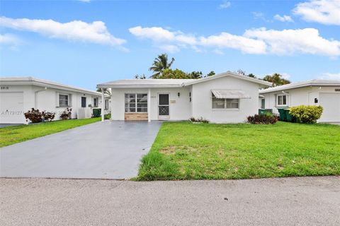 Photo of 5810 NW 82nd Ter, Tamarac, FL 33321 (MLS # A11791271)
