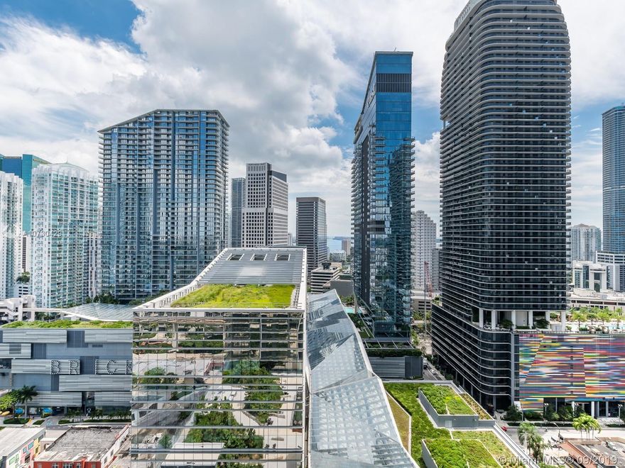 Largest 1/1.5 unit at RISE BRICKELL CITY CENTRE features 1,070 sqft, bay/river/city views, marble floors, open kitchen with quartz stone countertops, modern Italian kitchen cabinetry by Italkraft, Bosch appliances, U-Line temperature controlled wine storage, custom walk-in closet, black-out shades and stone flooring/walls throughout master bath. RISE is a luxury residential tower in the heart of Brickell/Downtown Miami located at BRICKELL CITY CENTRE, a multi-use complex including Saks Fifth Avenue, movie theaters, Italian food halls and more.  Building amenities include 24hr concierge/valet, an amenity deck with pool, jacuzzi, salon, hammam spa, fitness center, children’s play room, play ground and entertainment suites with chef’s kitchen and media room.  Easily accessible by Metromover.