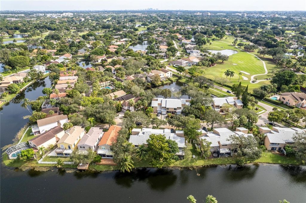 Photo of 9881 Fairway Cove Ln, Plantation, FL 33324 (MLS # A11498308)