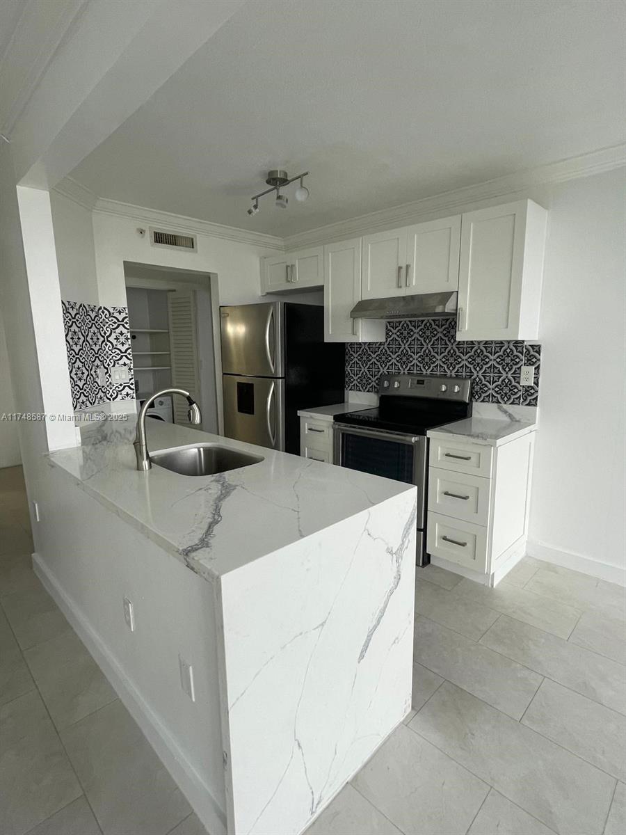 Spectacular unobstructed views from this oversized one bedroom two full bathrooms condo with open balcony and parking in the perfect South Beach location. Bright and spacious unit with updated kitchen and bathrooms, floor to celling glass in living room to take in the amazing vistas, generous built out closets, and hurricane shutters. In sought after building on West Ave and 17th St beside The Venetian Causeway with waterfront pool and hot tub, exercise room, 24 hr security and more. Next to popular Lincoln Rd. and Sunset Harbour shopping and entertainment areas. Great price for a perfect piece of paradise.