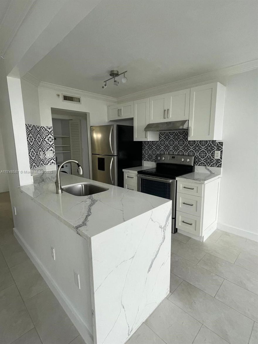 Spectacular unobstructed views from this oversized one bedroom two full bathrooms condo with open balcony and parking in the perfect South Beach location. Bright and spacious unit with updated kitchen and bathrooms, floor to celling glass in living room to take in the amazing vistas, generous built out closets, and hurricane shutters. In sought after building on West Ave and 17th St beside The Venetian Causeway with waterfront pool and hot tub, exercise room, 24 hr security and more. Next to popular Lincoln Rd. and Sunset Harbour shopping and entertainment areas. Great price for a perfect piece of paradise.