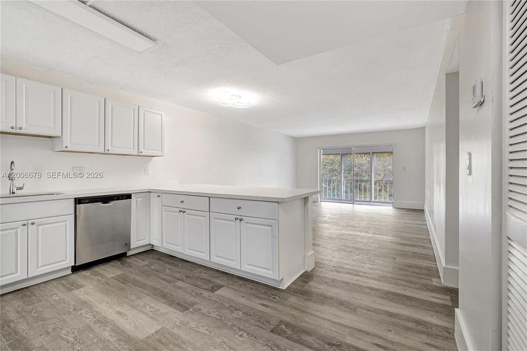 Photo of 4800 Hillcrest Ln #207, Hollywood, FL 33021 (MLS # A12006679)