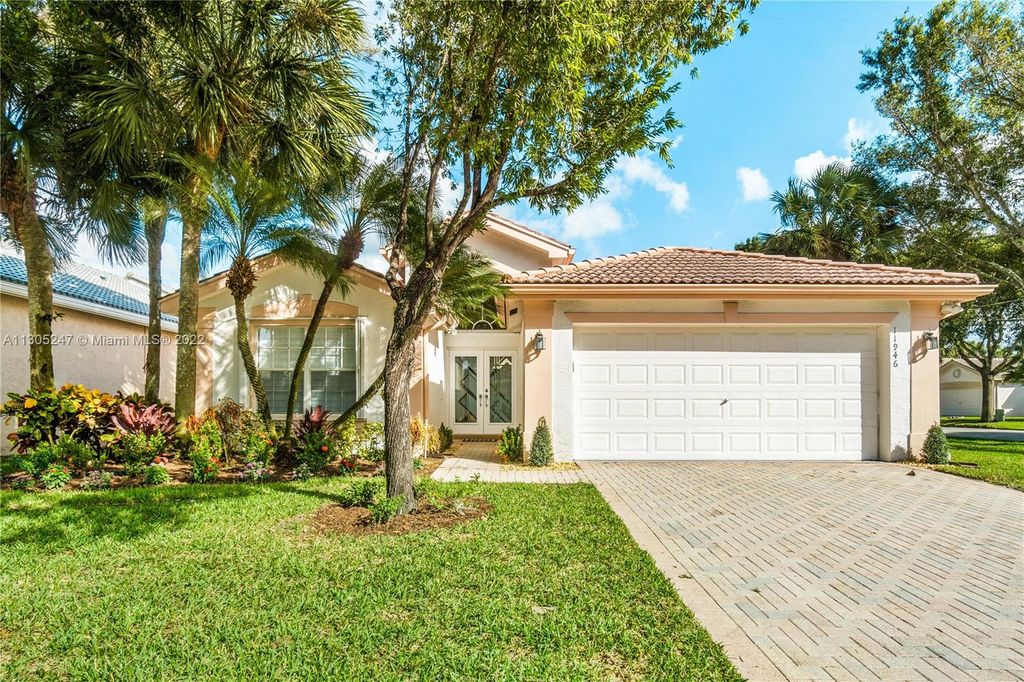 Photo of 11946 Arias Ave, Boynton Beach, FL 33437 (MLS # A11305247)