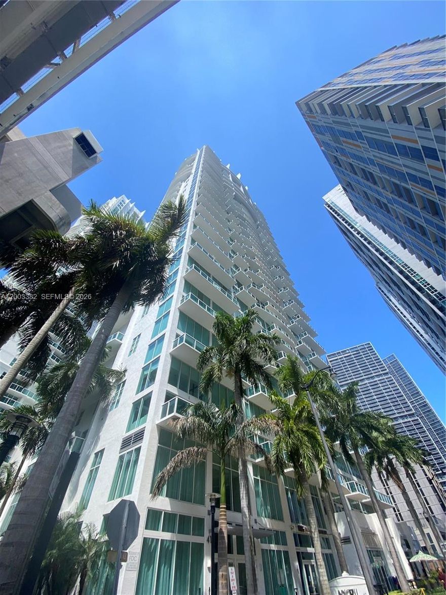 Beautiful condo located in the desirable Brickell on the River. This unit features 2 bedrooms plus a den and 2 full bathrooms, along with two private balconies offering open city views. The interior includes marble flooring throughout and an open living and dining layout. A standout feature is the two assigned parking spaces, a rare offering in the Brickell area, in addition to valet parking. The building offers amenities such as a swimming pool, fitness center, and 24-hour security. Conveniently located near Brickell City Centre, dining options, and with direct access to the Metrorail.