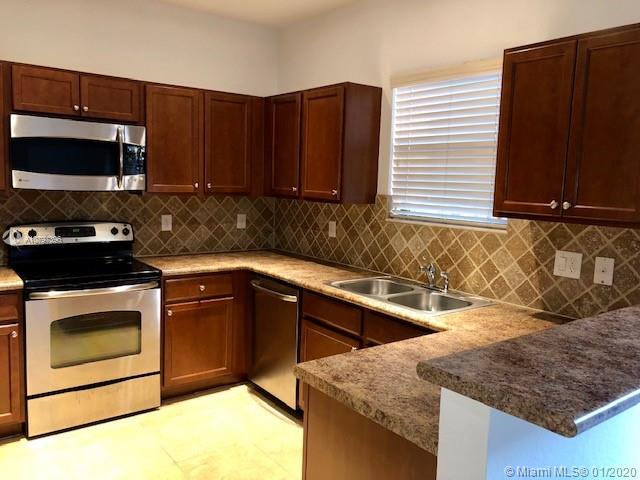 CENTURY GARDENS AT TAMIAM - Residential Lease