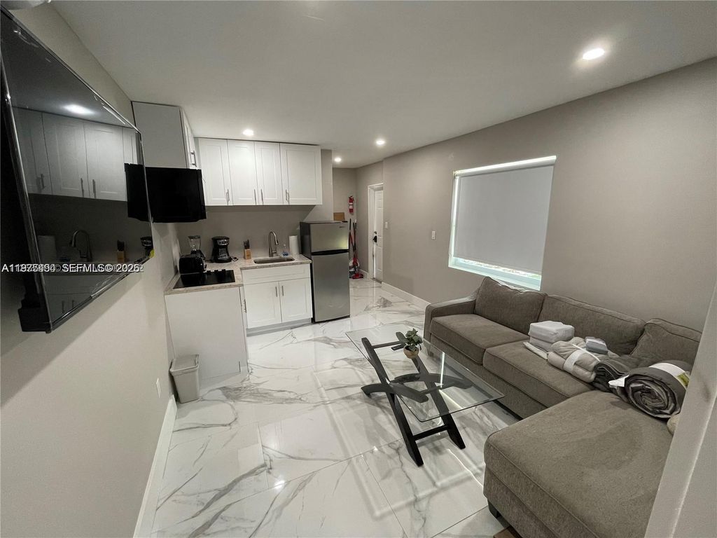 Photo of 4910 SW 28th Ter #3, Dania Beach, FL 33312 (MLS # A11975494)