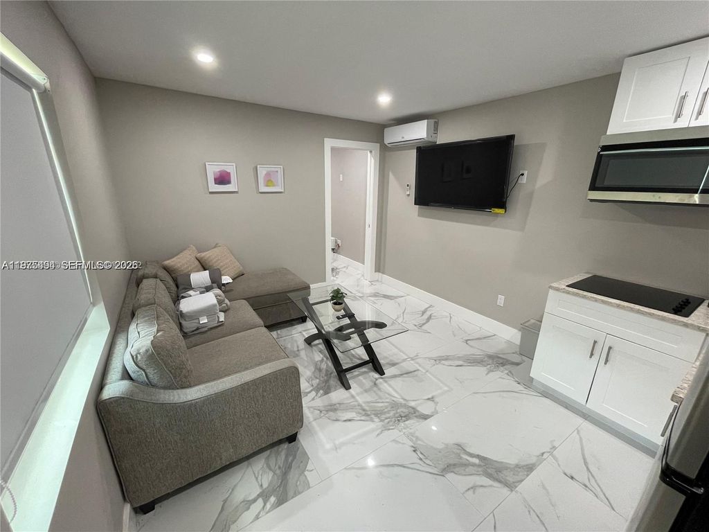 Photo of 4910 SW 28th Ter #3, Dania Beach, FL 33312 (MLS # A11975494)