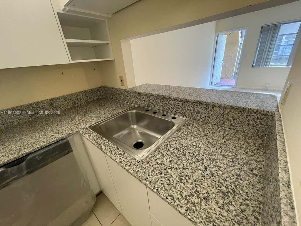 Photo of 820 Twin Lakes Dr #820, Coral Springs, FL 33071 (MLS # A11862902)