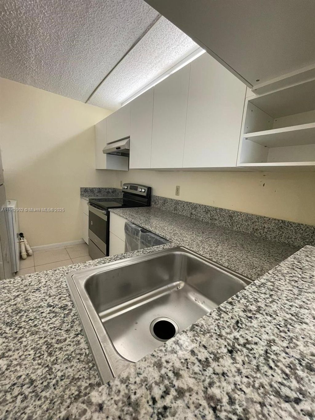Photo of 820 Twin Lakes Dr #820, Coral Springs, FL 33071 (MLS # A11862902)