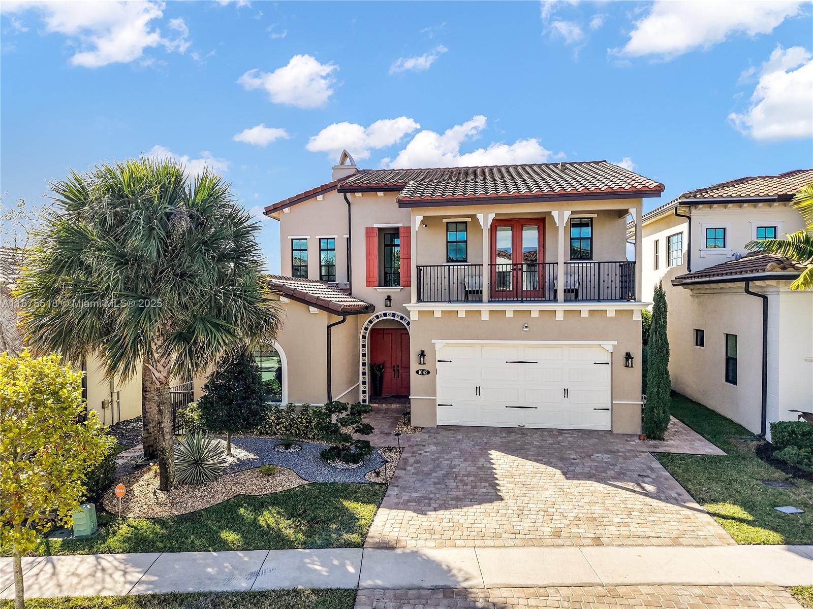 This stunning home has 4-bedrooms, 4.5-bathrooms, an office and loft. Located in the luxurious gated community of Raintree. Ideal for those moving to or working in South Florida, this residence features two suites on the first floor, along with the office. Upstairs, there is the loft, two more bedrooms and a balcony. Impact windows. The quiet patio is elegant, spacious and overlooks the lake. All the appliances are top-of-the-line, window shades are with remote control, all the 7 TVs, generator, freezers in the garage and much more stay in the house. Owner will keep paying for an extra gardening service. The house is also equipped with a 24-hour surveillance camera system featuring 7 cameras outside that monitor the house. Close to major highways, great plazas and restaurants. A must see!