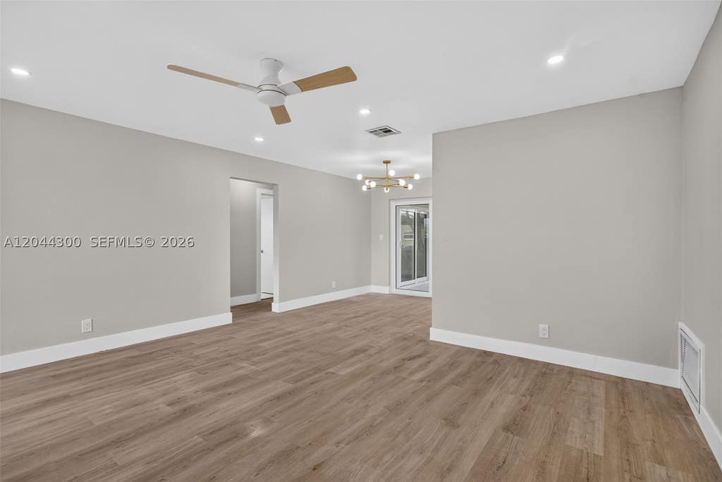 Photo of 5711 NW 48th Ter, Tamarac, FL 33319 (MLS # A12044300)