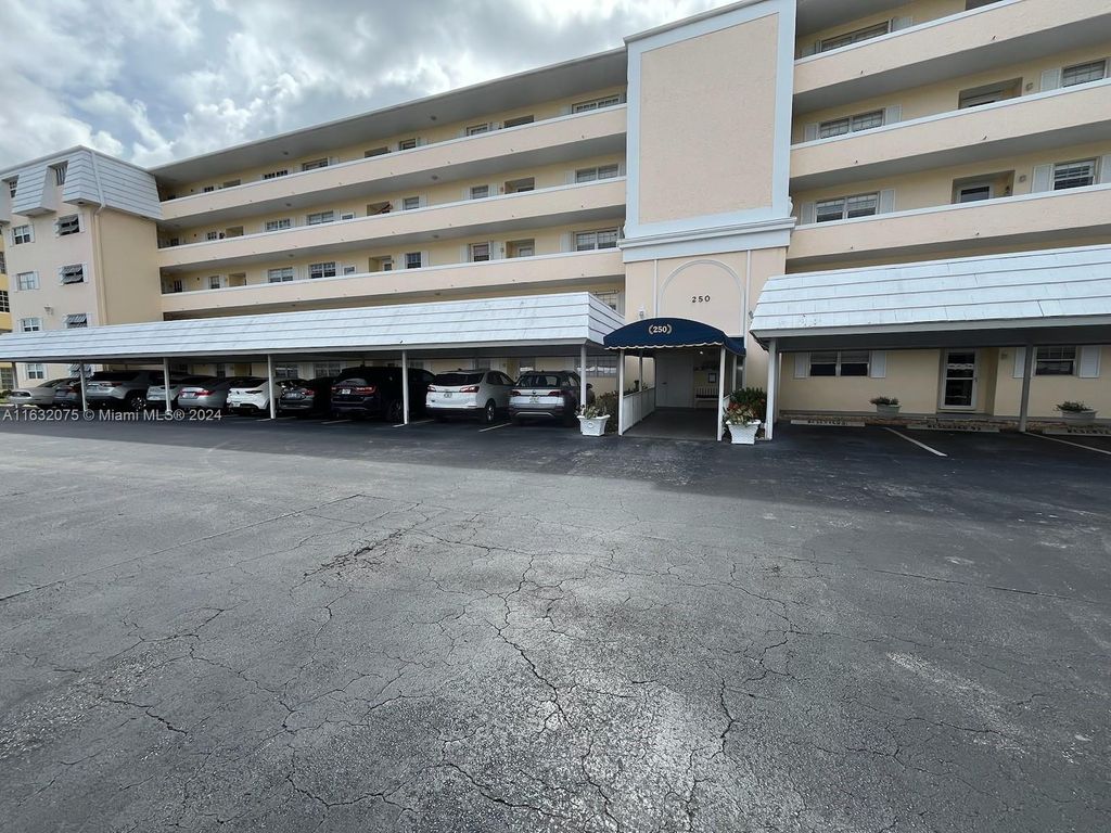 Photo of 250 John F Kennedy Dr #303, Atlantis, FL 33462 (MLS # A11632075)