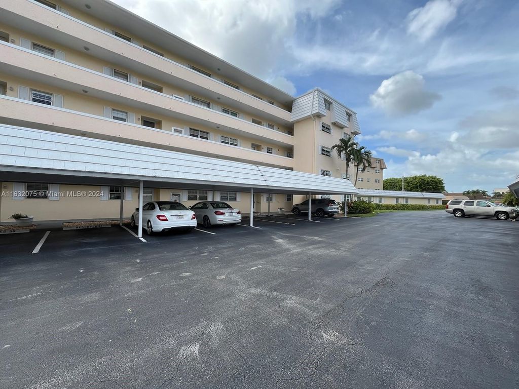 Photo of 250 John F Kennedy Dr #303, Atlantis, FL 33462 (MLS # A11632075)