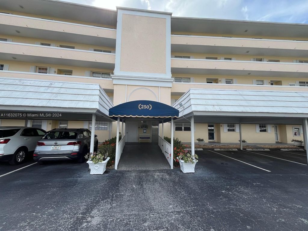 Photo of 250 John F Kennedy Dr #303, Atlantis, FL 33462 (MLS # A11632075)