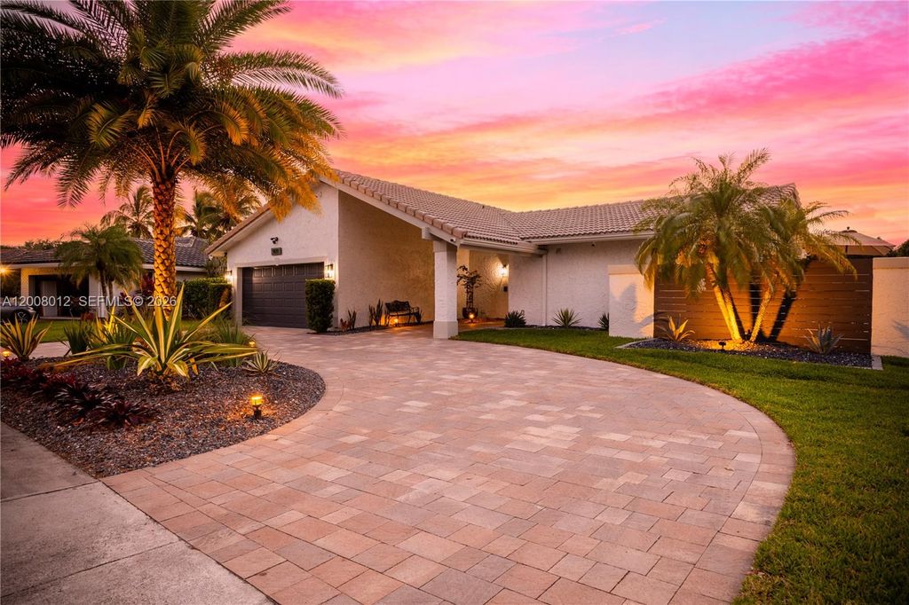 Photo of 9171 NW 13th St, Plantation, FL 33322 (MLS # A12008012)
