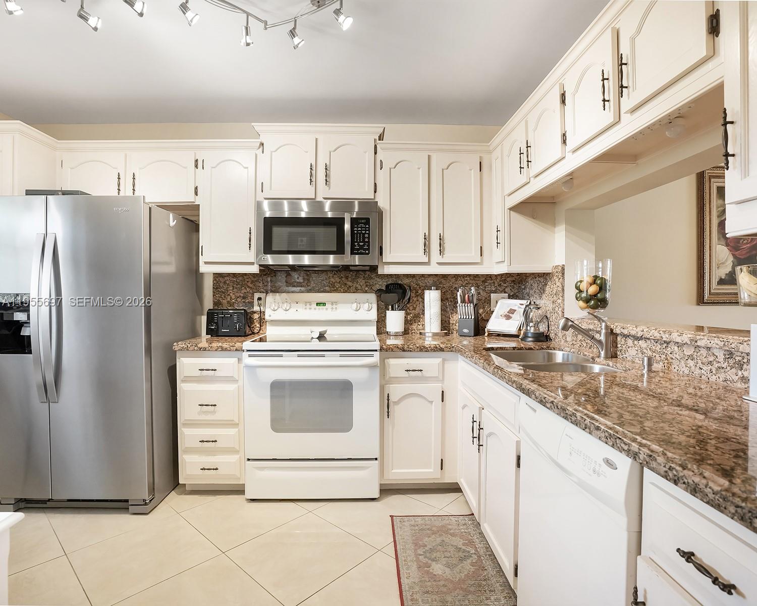 LAKES OF ENVIRON CONDO - Residential