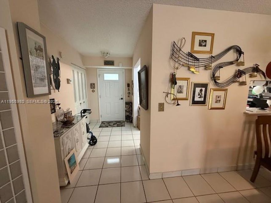 Stunning large unit with ample custom-made walkways and hallways 2/2 move in ready unit located in the heart of Dania Beach, breathtaking views of the lake, pool and fountain. The only unit that has custom made wide and ample entrance and hallways, making it an easy access for wheelchairs. Secure windows and close to schools with constant security. NEW kitchen appliances, NEW A/C unit, tankless water heater, in unit washer and dryer (only allowed on the first floor) California closets built-in cabinets, updated bathrooms with separate shower and bathtub. Quiet community, close to beaches, shopping, restaurants and State Parks. Large screened in glass patio with large ceiling fan keeps patio cool while enjoying the lake view and pool. Easy access to pool and community center.  Rent after two years of ownership. FULL RESERVES, LOW HOA, ASSESSMENTS PAID, ONE PERSON to be 55+  
High quality Baer's furniture. Low monthly maintenance fee, very well-maintained building, one assigned parking right outside your front door and extra parking available. Storage available for each unit. This rare, move-in-ready, remodeled, hurricane-proof front door & major upgrades. Don’t miss out! Ceiling fans in every room, secured windows and locks. Partially Furnished. 
LOW MAINTENANCE $415 Extra custom-made hallways and walkways for wheelchair and ample feeling.