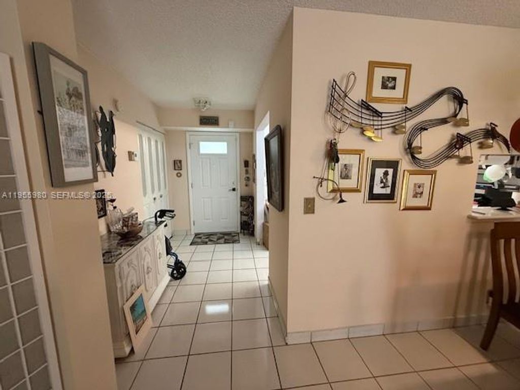 Photo of 414 SE 10th St #102, Dania Beach, FL 33004 (MLS # A11955980)