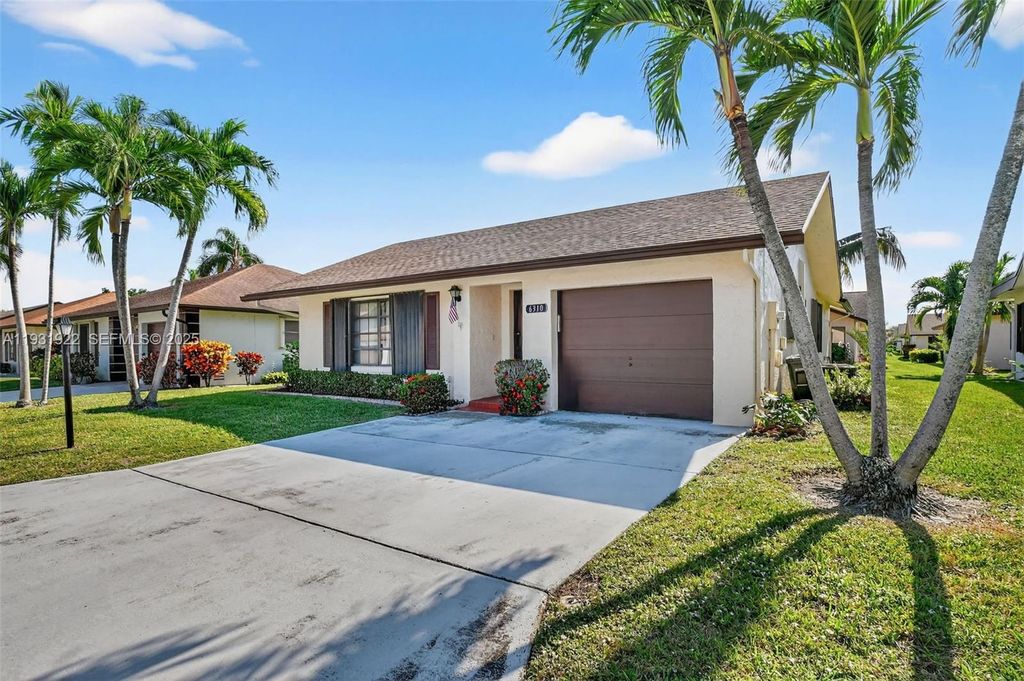 Photo of 6310 Tall Cypress Cir, Green Acres, FL 33463 (MLS # A11931922)