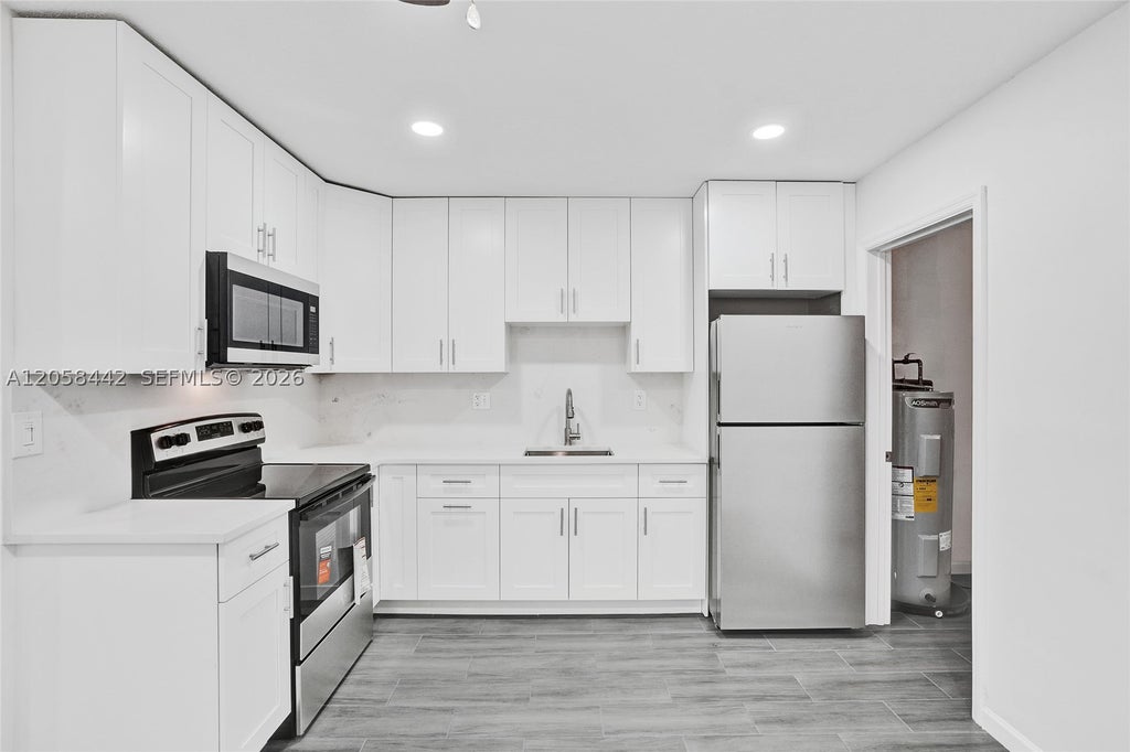 Photo of 5900 NW 19th St #A, Sunrise, FL 33313 (MLS # A12058442)
